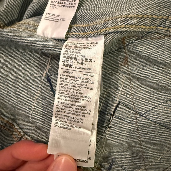 Denim jacket with patches and patterns - Picture 4 of 4